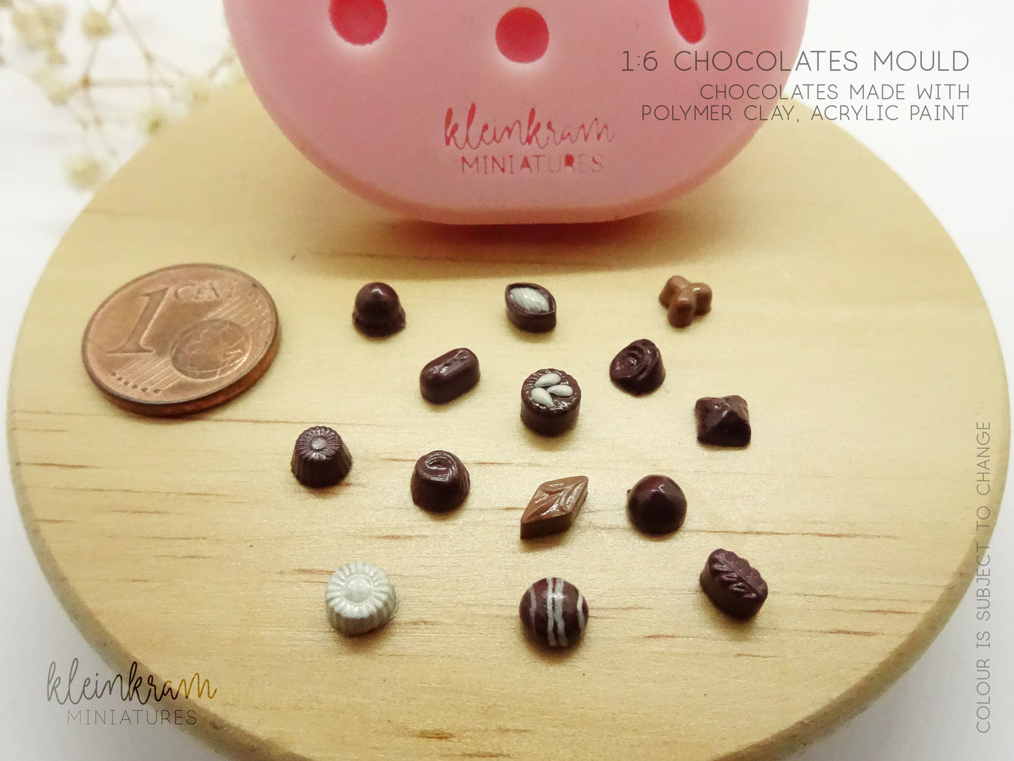 Close up of miniature chocolates in 1:6 (playscale) made with silicone mould 1 cent coin for size comparison