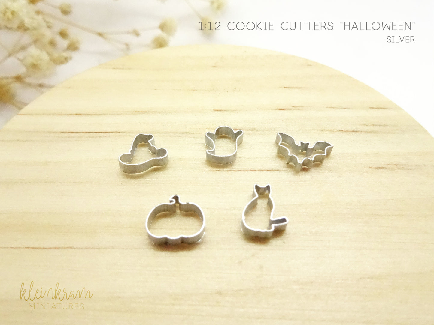 Miniature cookie cutters in 1:12 scale for decorating dollhouses, silver